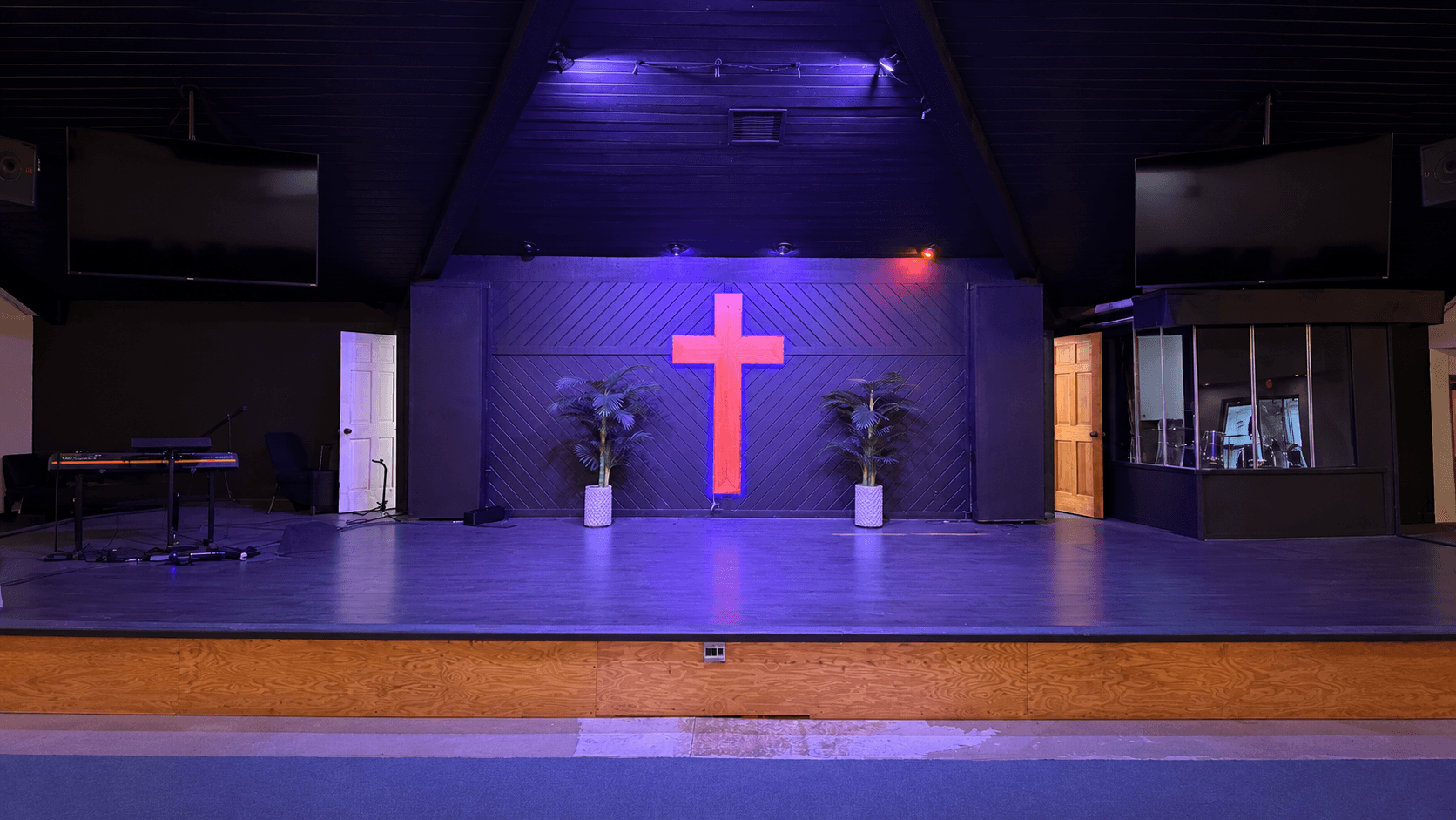 Peachtree Corners worship stage with its original cross wall