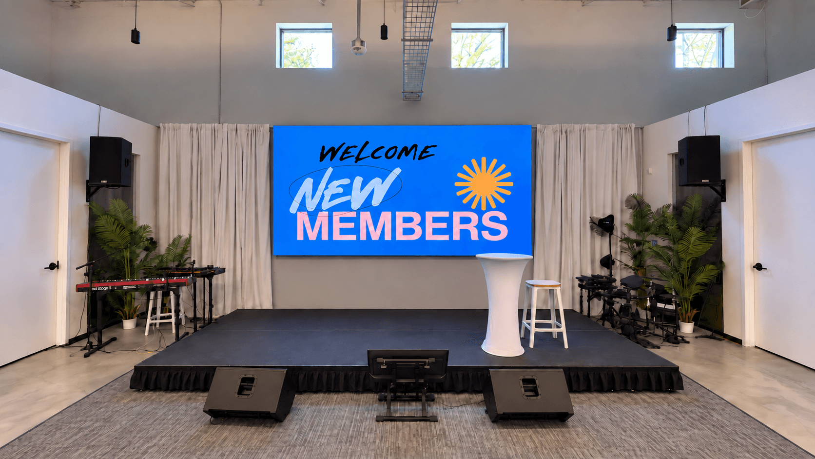 Brookhaven worship stage with the welcome display installed